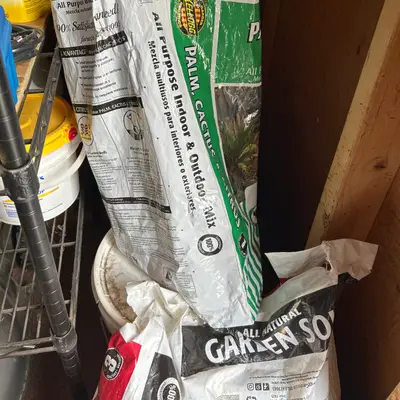 Bagged potting mix and garden soil