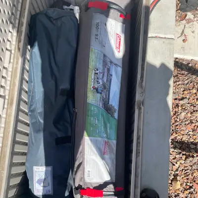 Coleman canopy (with chair stored alongside)