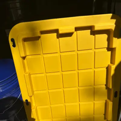 Heavy-duty plastic stacking container