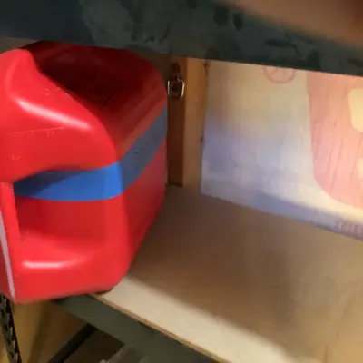 Red plastic gas can
