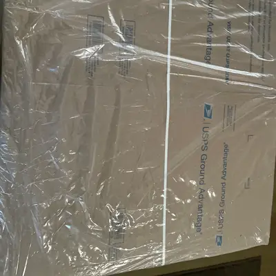 Flat cardboard parcel (unopened)