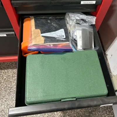 Drawer of cases & bagged parts