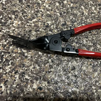Automotive trim/panel clip removal pliers